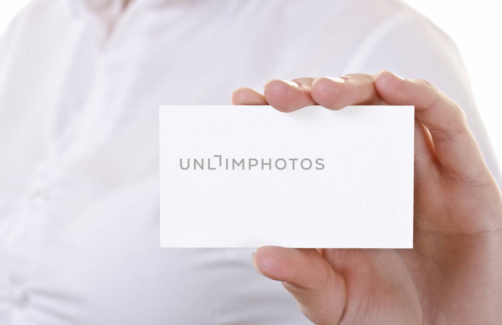 Businesswoman showing and handing a blank business card. Business woman in white shirt, high key. 