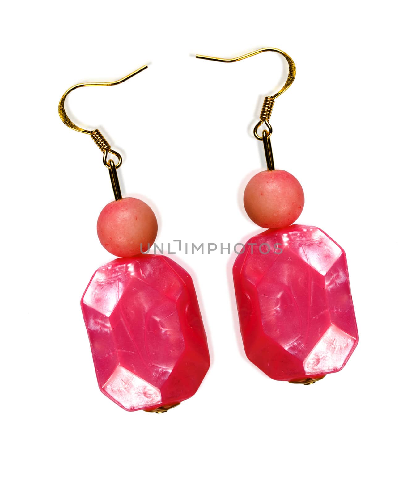 Earrings made of plastic and glass pink isolated on a white background. Collage.