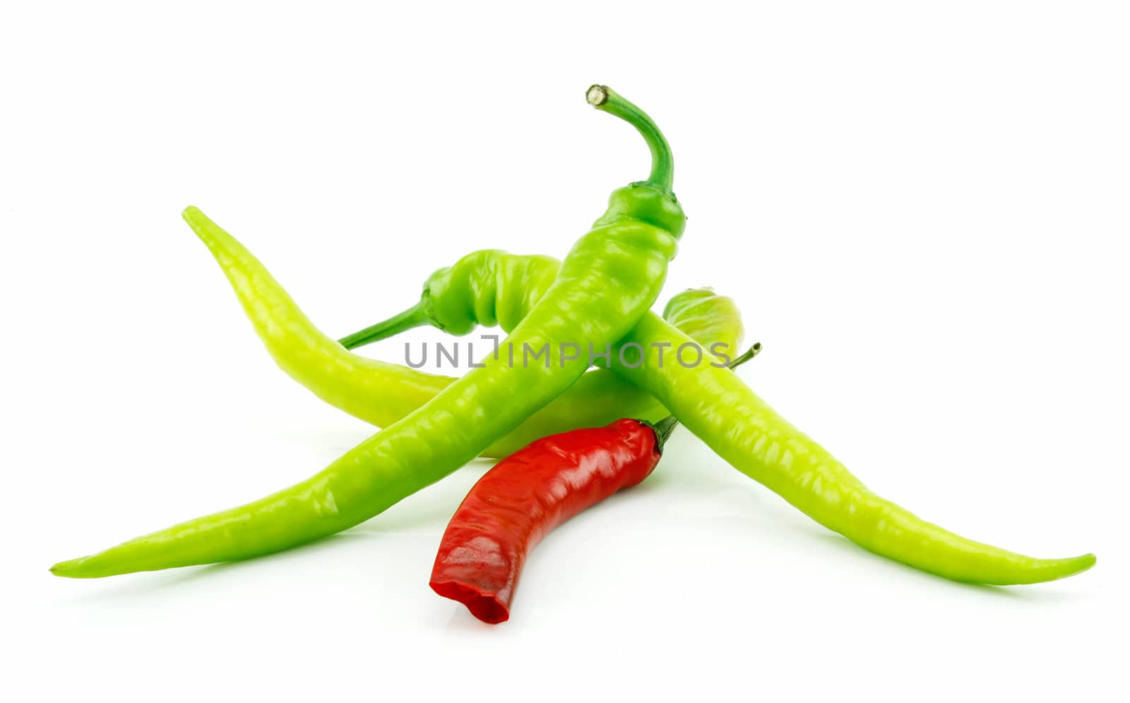 Green and Red Chili Peppers Isolated on White by alphacell
