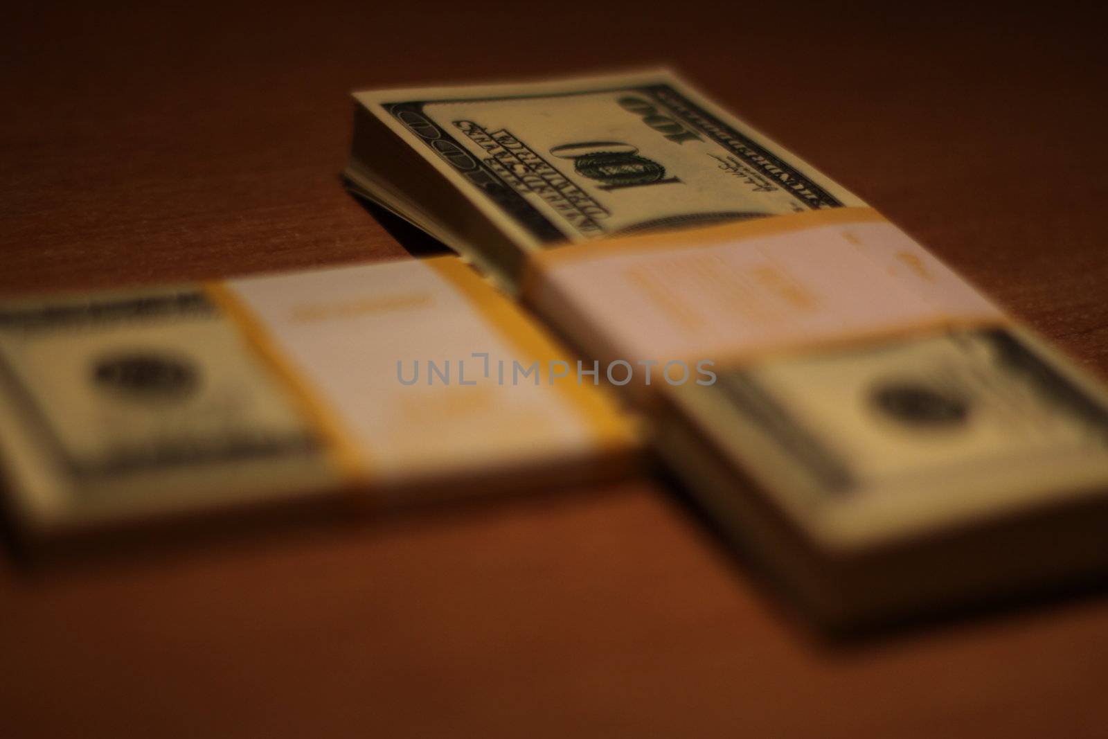 Stacks of Hundred Dollar Bills by MichaelFelix