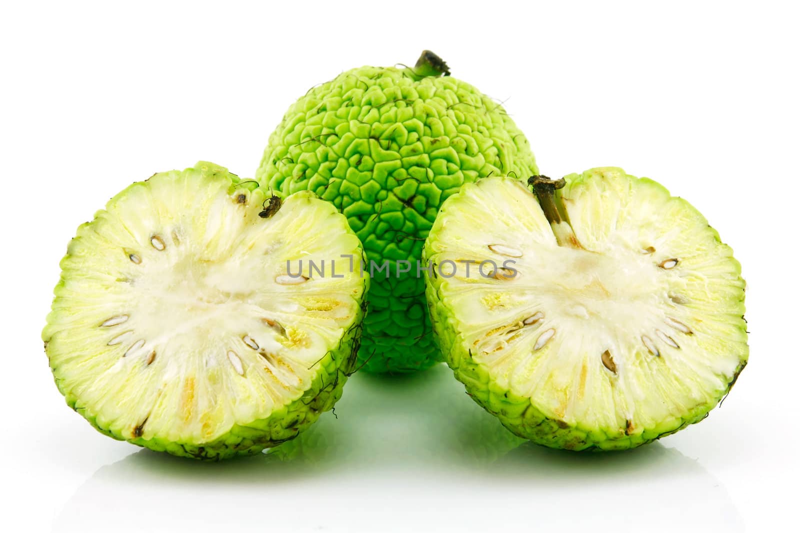 Sliced Osage Oranges (Maclura) Isolated on White Background