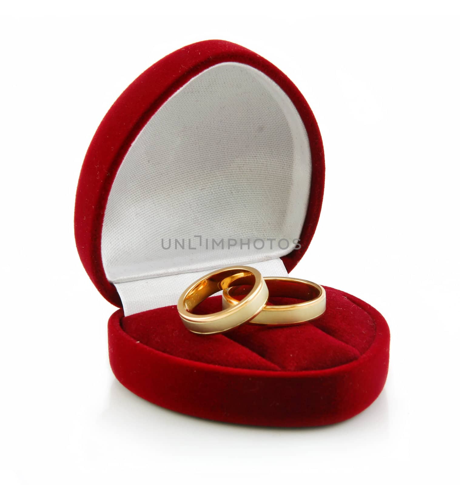 Golden Rings in Heart-Shaped Box Isolated by alphacell