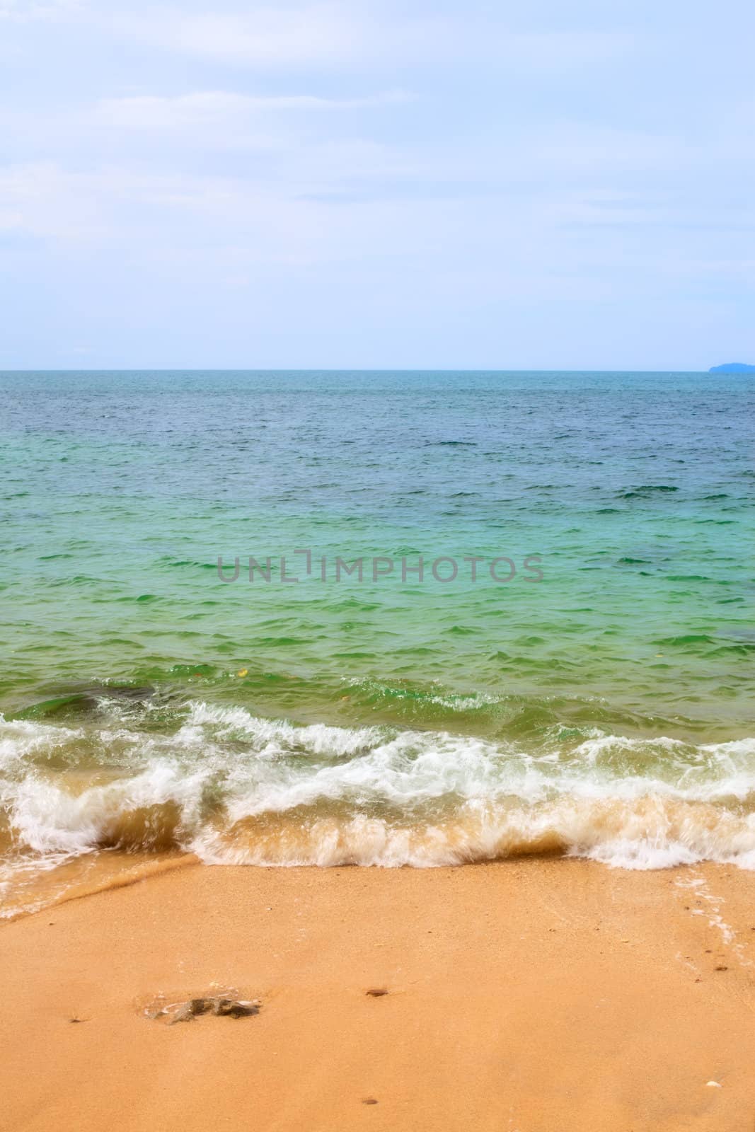 sunny beach, blue ocean and clean sky