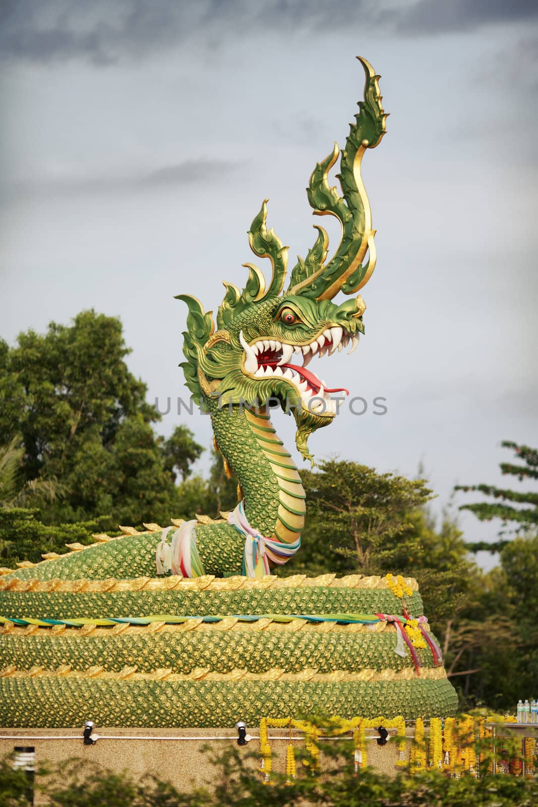 green water dragon statue in Krabi, Thailand