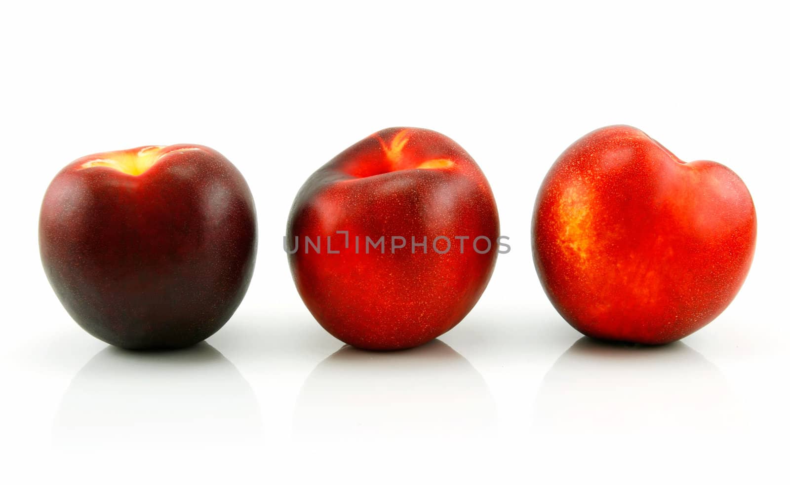 Three Ripe Peaches (Nectarine) by alphacell