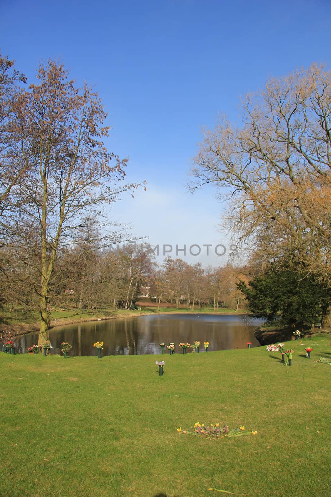 park and pond near a crematorium, places of worship where ash is spread