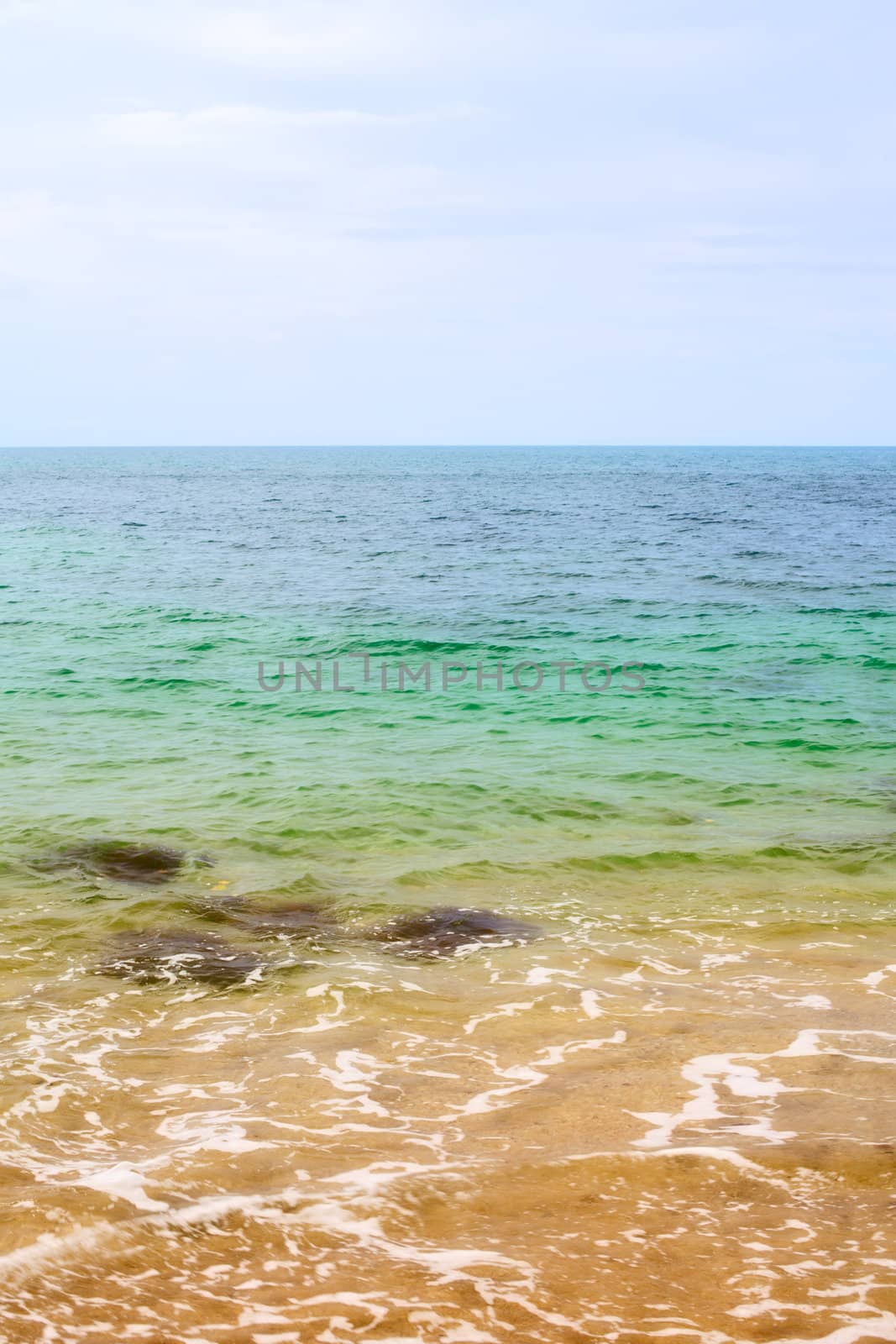 sunny beach, blue ocean and clean sky