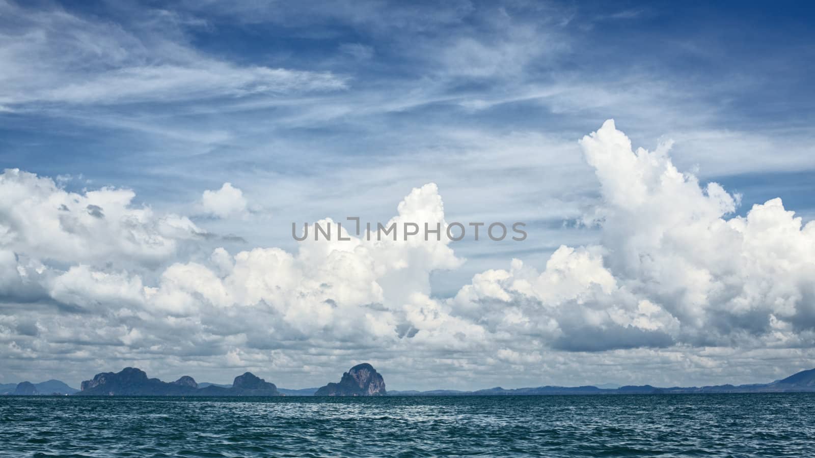 tall cliff with trees at Andaman Sea, Thailand