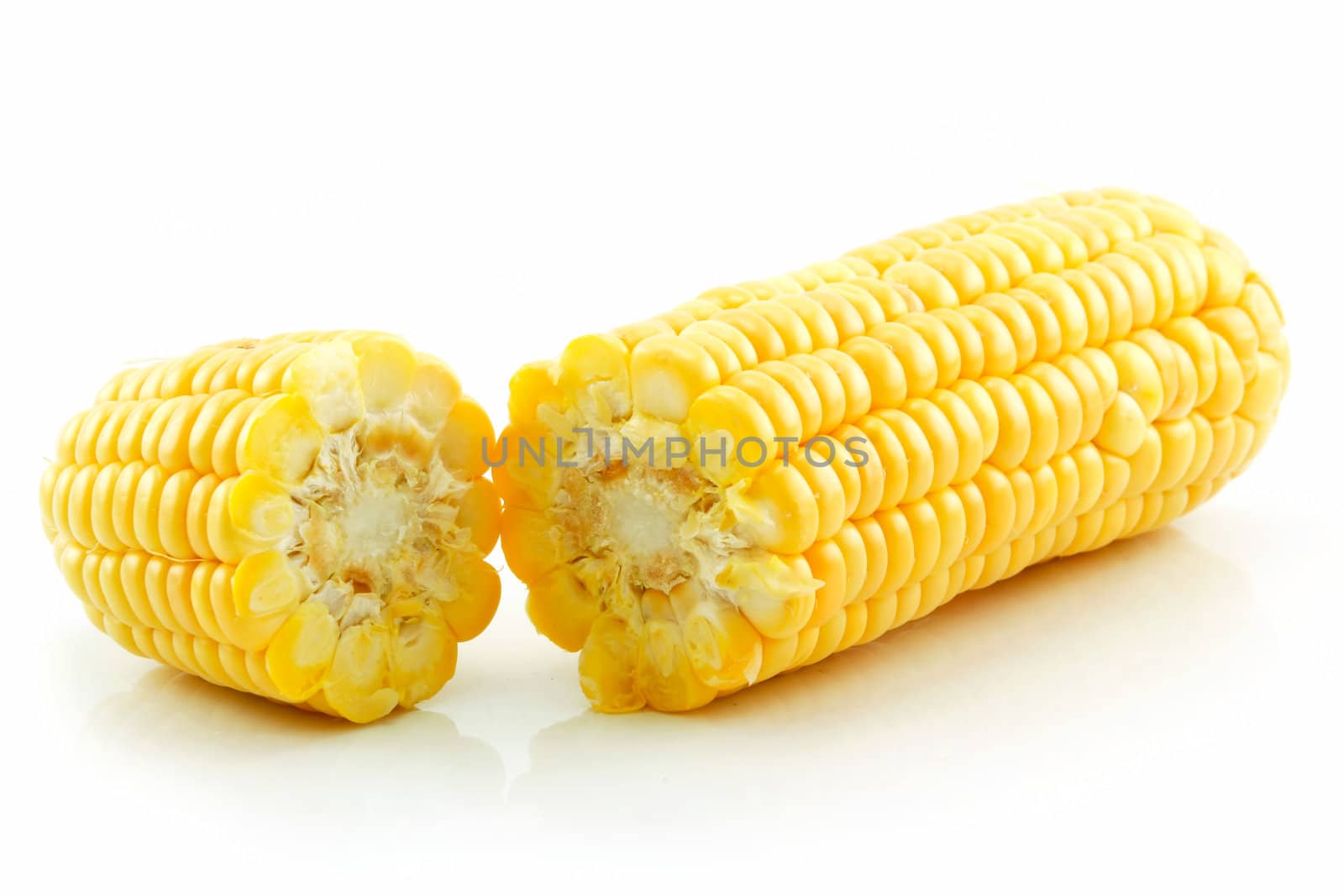 Ripe Broken Corn Isolated on White by alphacell