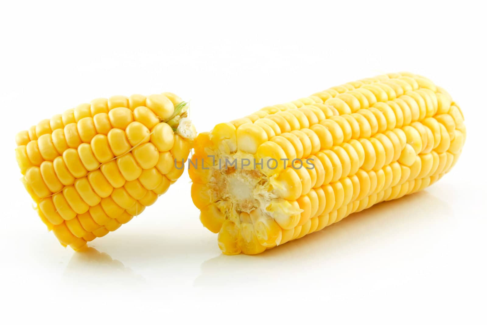 Ripe Broken Corn Isolated on White by alphacell