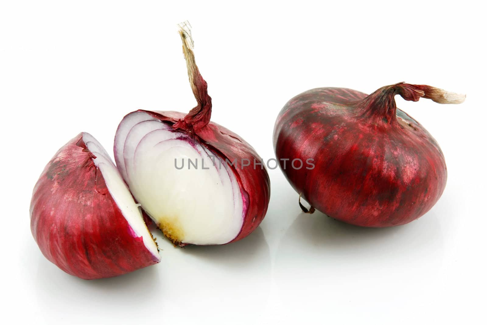 Ripe Sliced Red Onion Isolated on White by alphacell