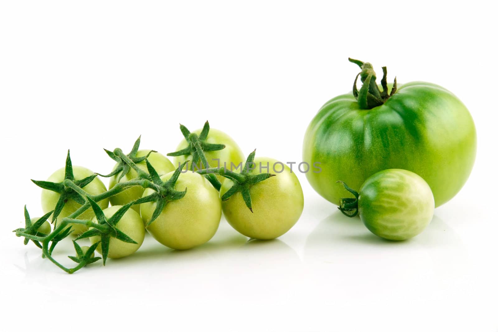 Bunch of Ripe Yellow and Green Tomatoes Isolated on White by alphacell