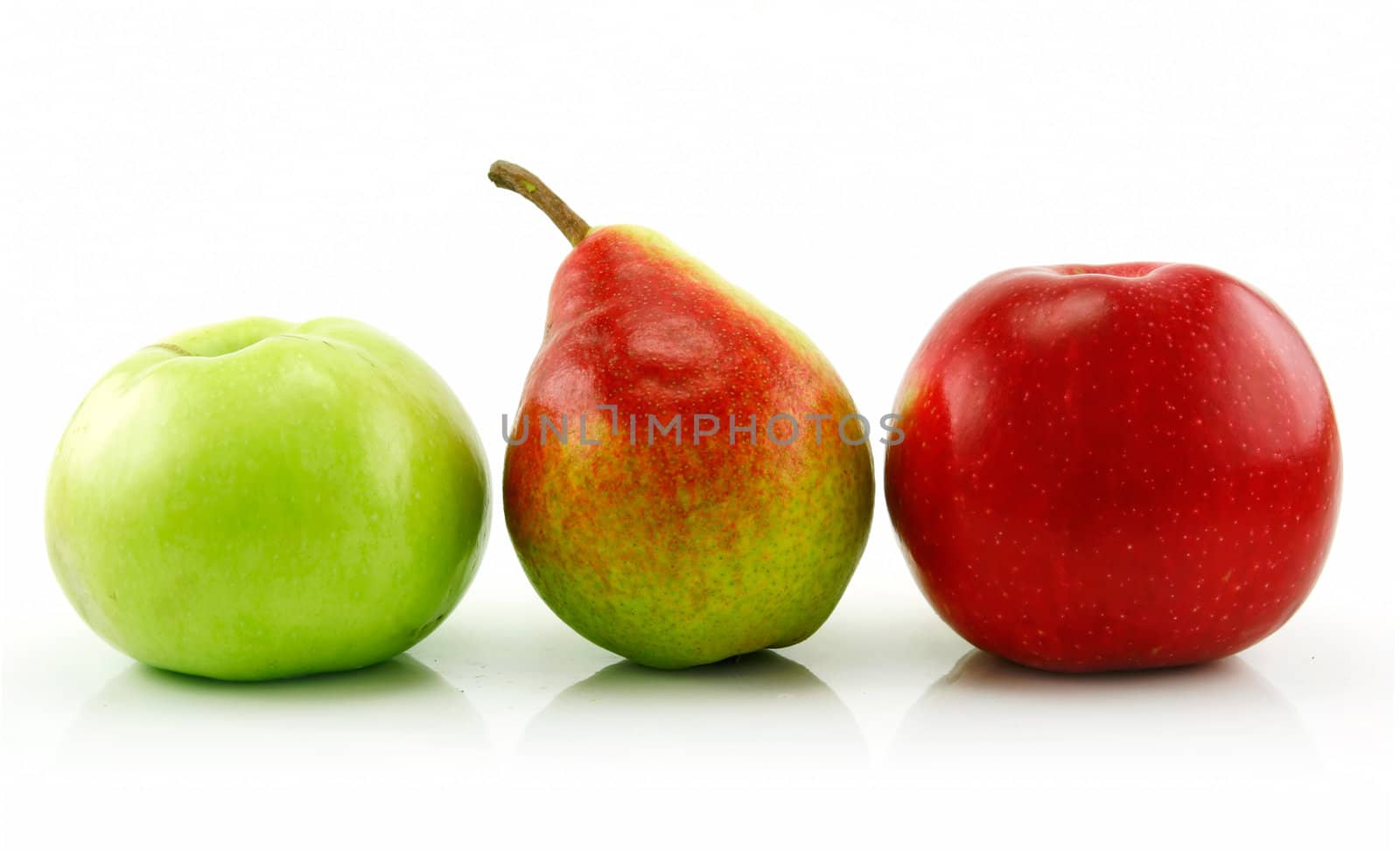 Ripe Apples and Pear in a Row Isolated on White by alphacell