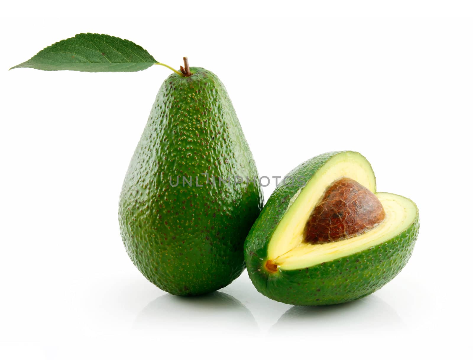 Ripe Avocado With Green Leaf Isolated on White by alphacell