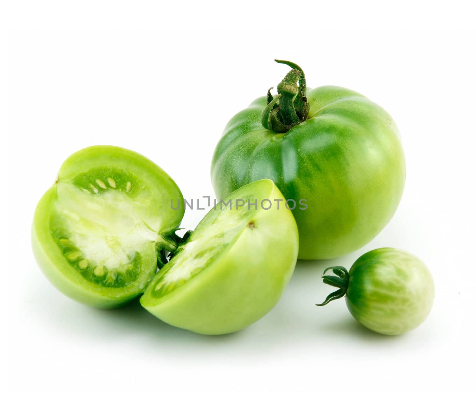 Ripe Green Sliced Tomatoes Isolated on White Background