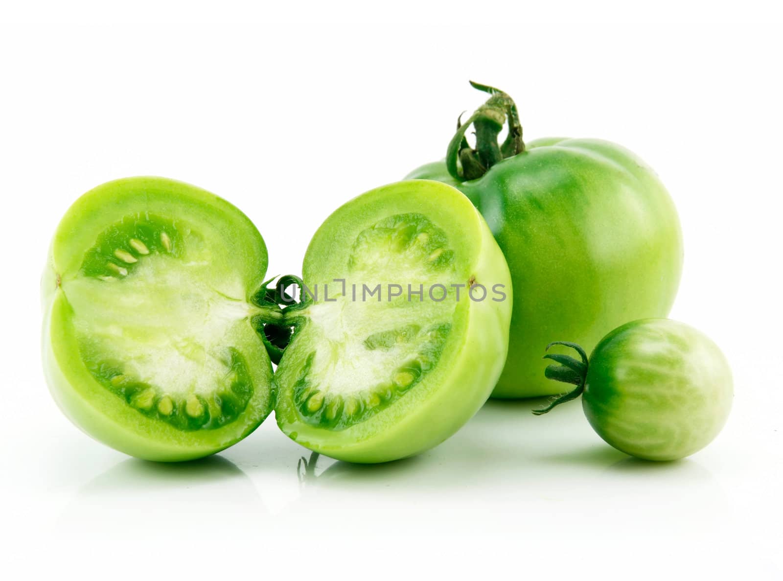 Ripe Green Sliced Tomatoes Isolated on White Background