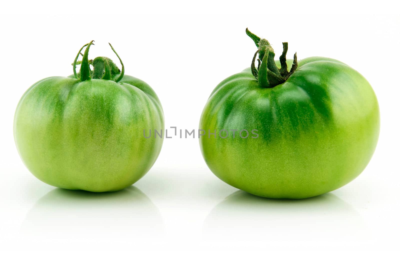 Two Ripe Green Tomatoes Isolated on White Background