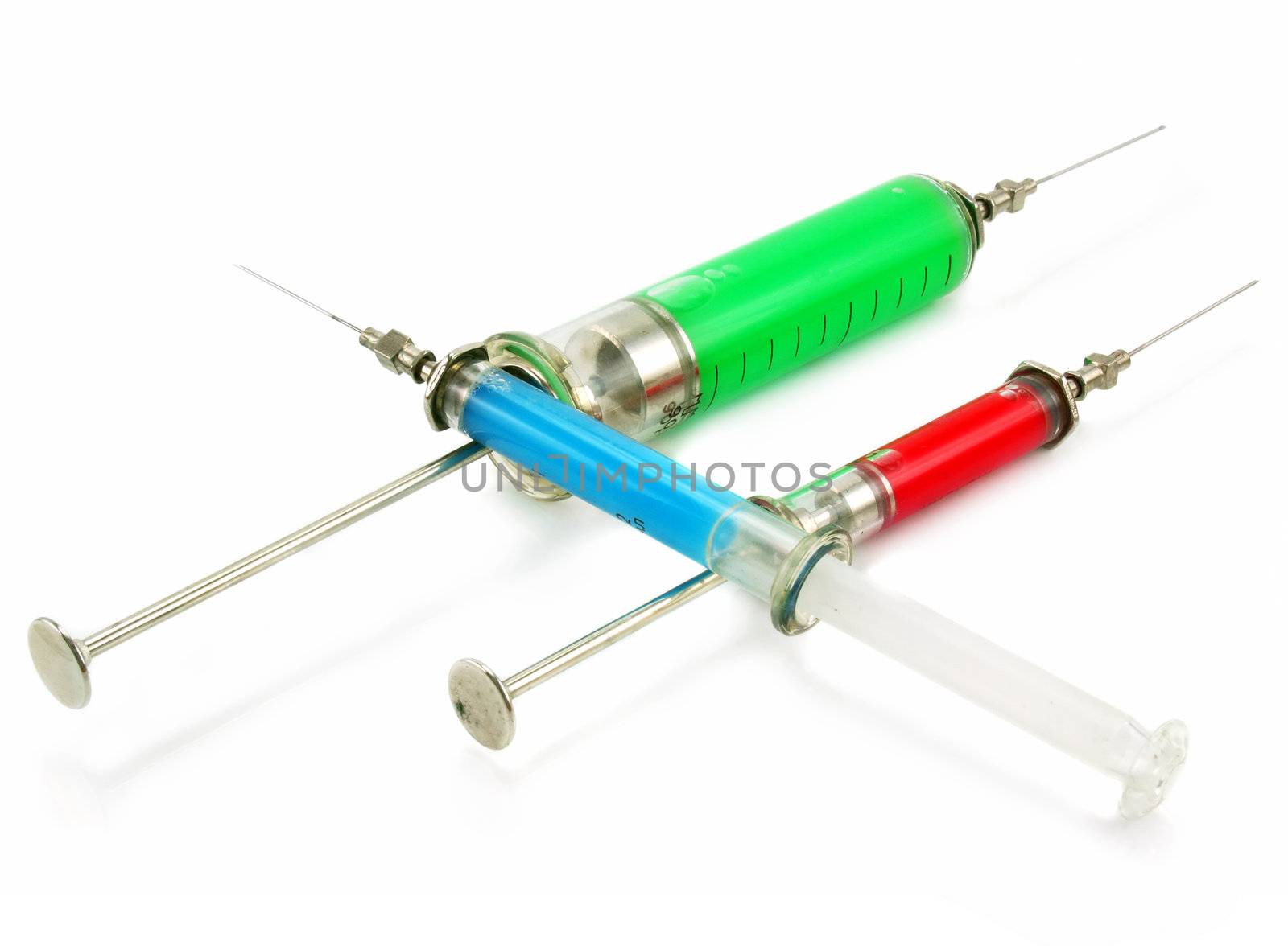 Three reusable syringes with acid substance isolated on a white background