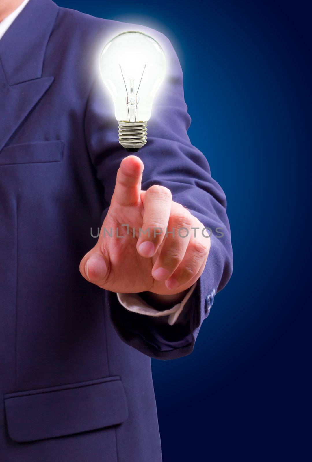 hand pointing light bulb  by tungphoto