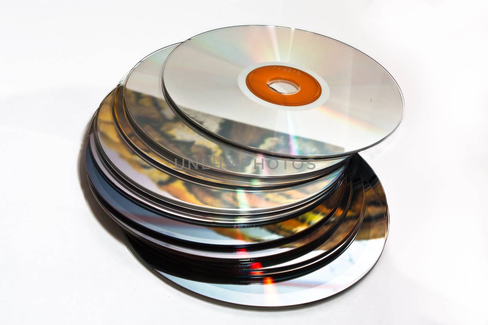 Heap of CD on the white background.