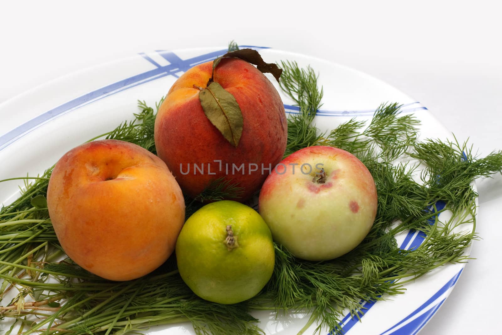 fruit on plate isolated on white background.