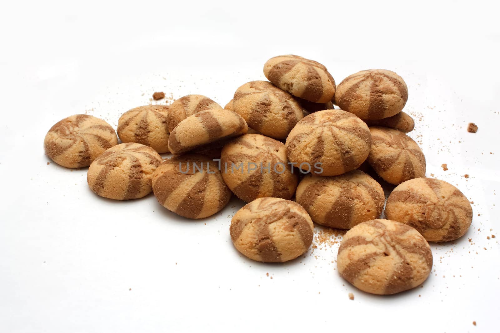 heap of cookies on white background.