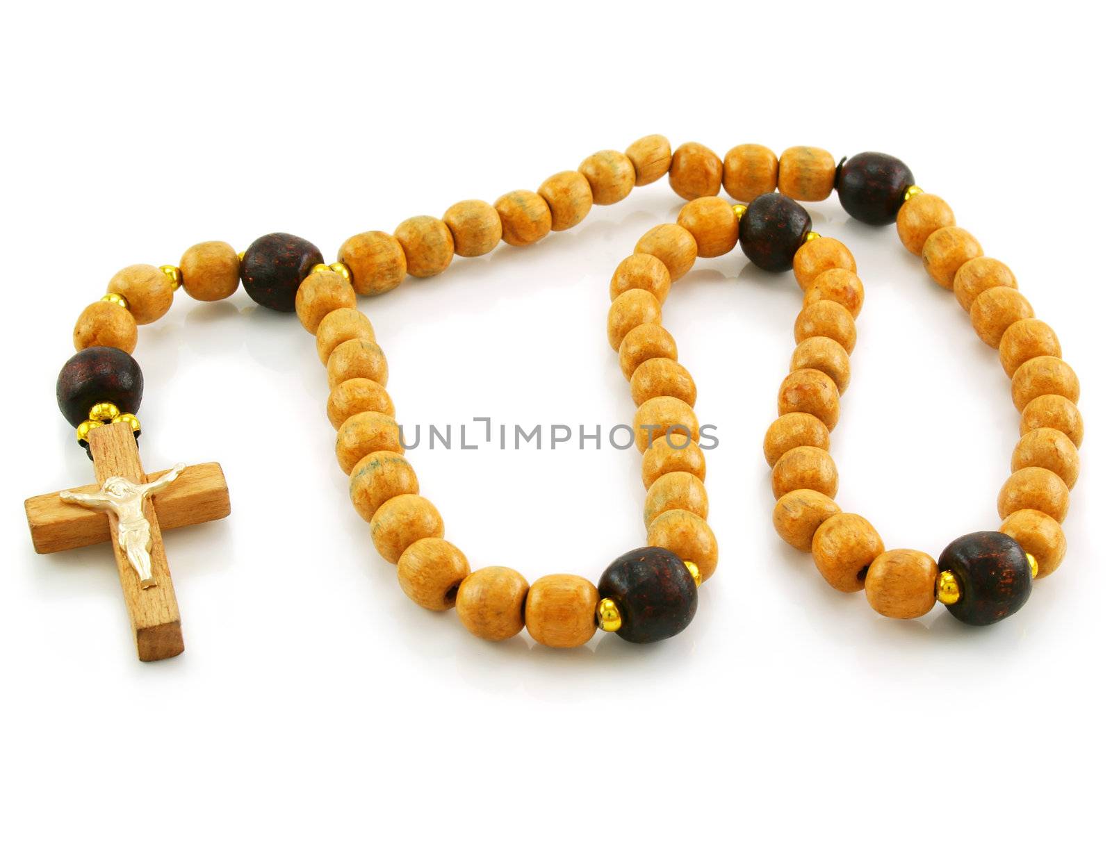 Wooden rosary and cross isolated on a white background