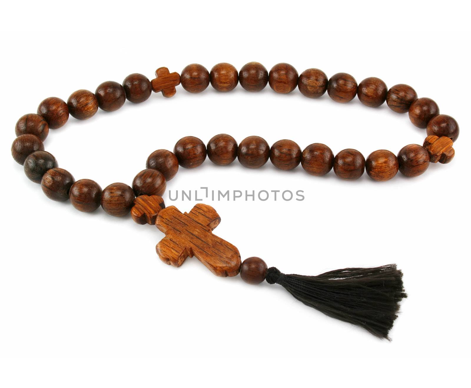 Wood rosary isolated on a white background