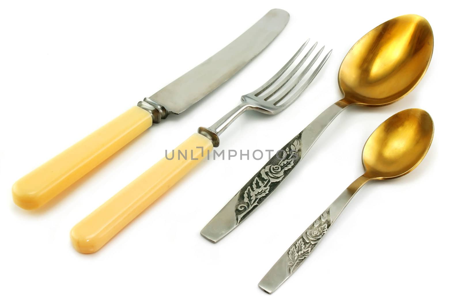Set of silver flatware isolated on a white background