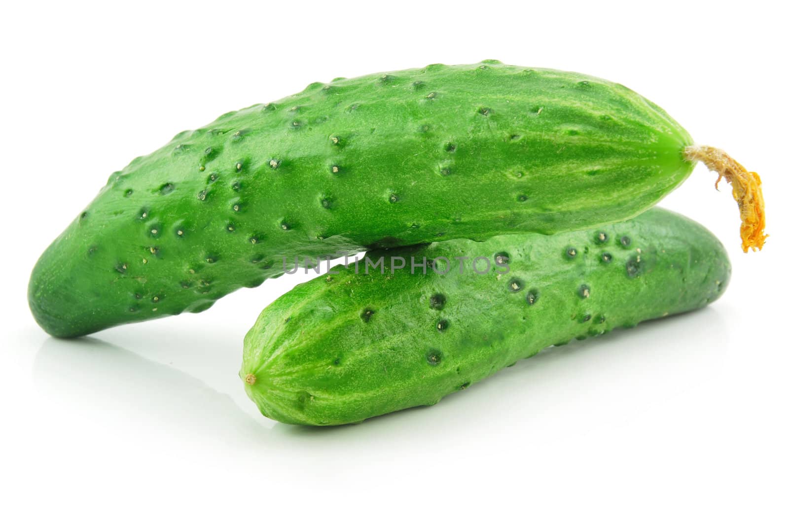 Ripe Cucumbers Isolated on White by alphacell