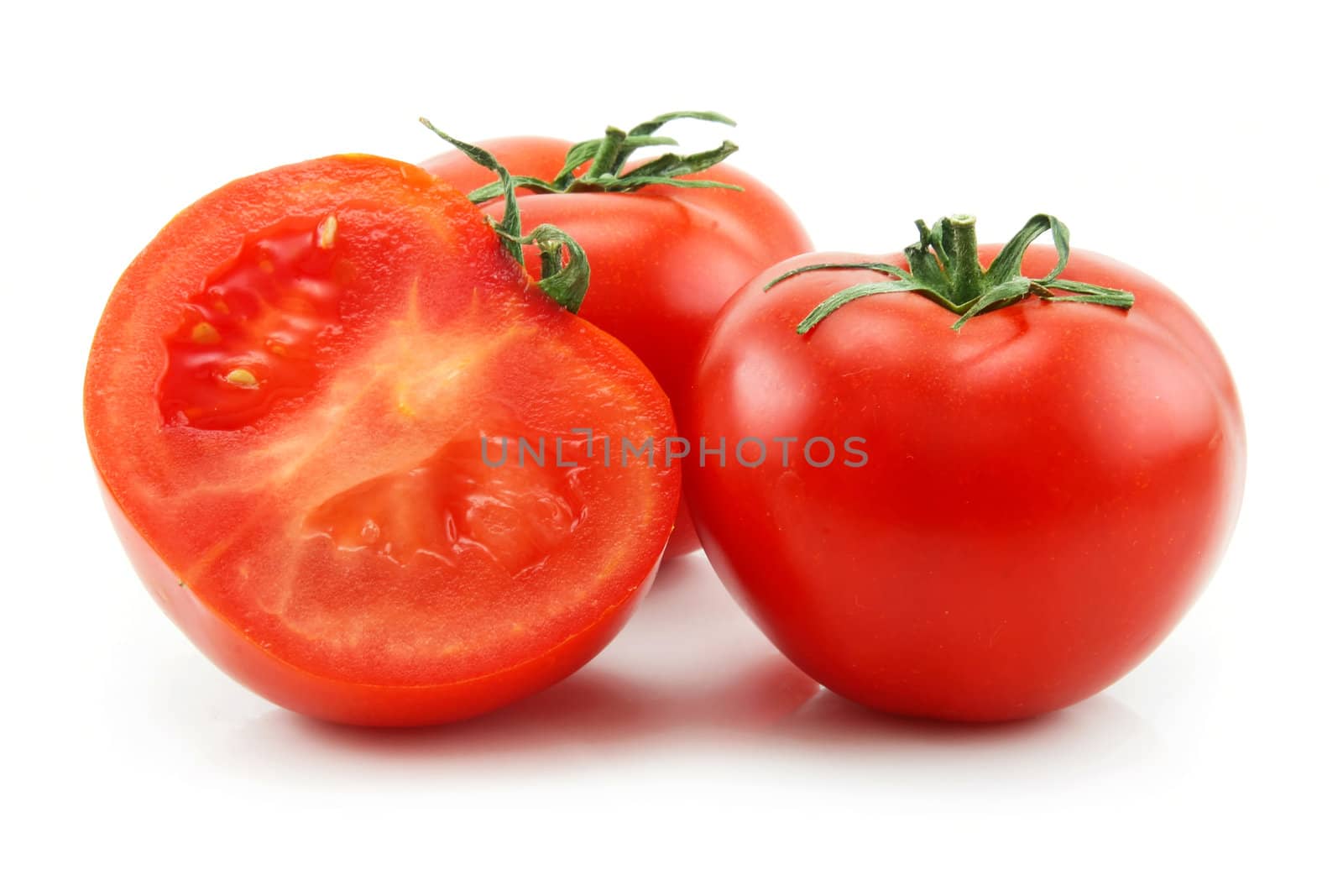 Ripe Sliced Tomatoes Isolated on White Background