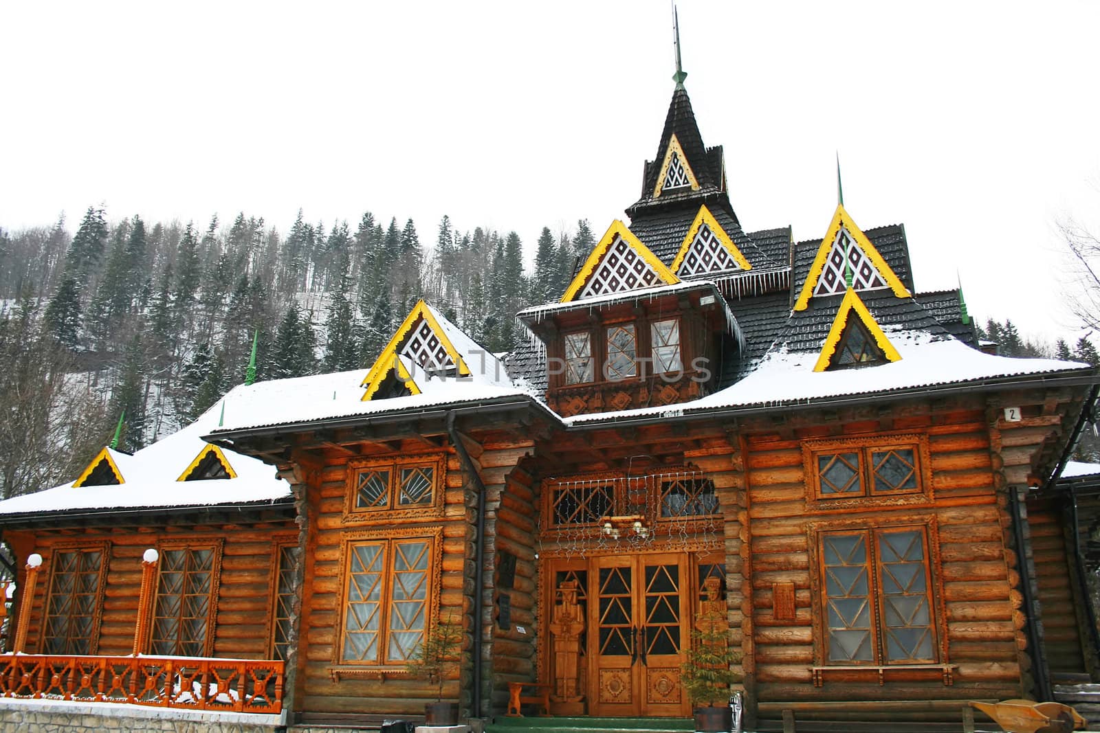 Traditional log house by alphacell