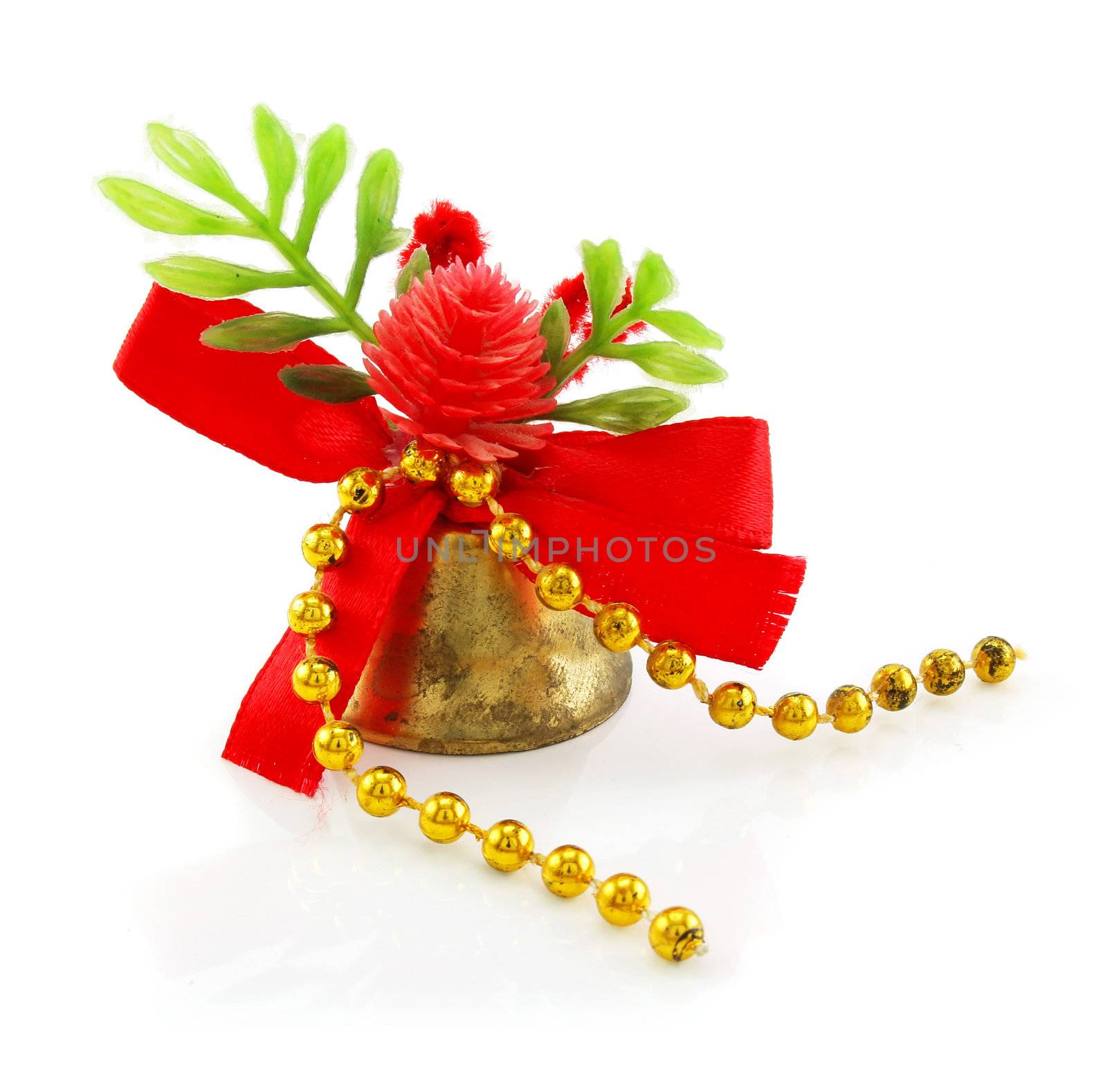 Christmas hand bell with red bow isolated on a white background