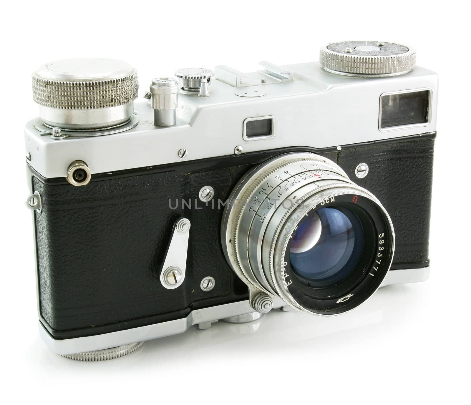 Old film photo camera and isolated on a white background