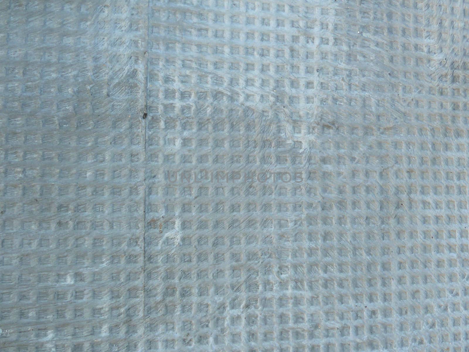 closeup of a section of grey patterned concrete