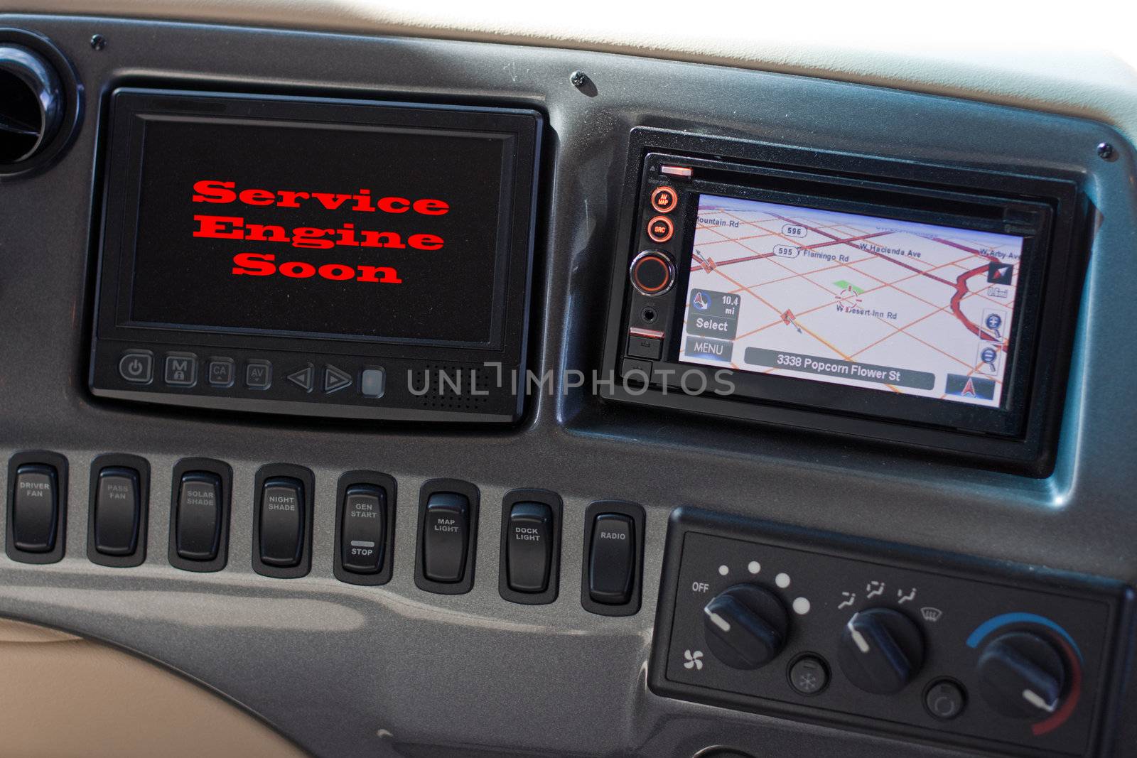 Motor home dashboard with service engine light and GPS