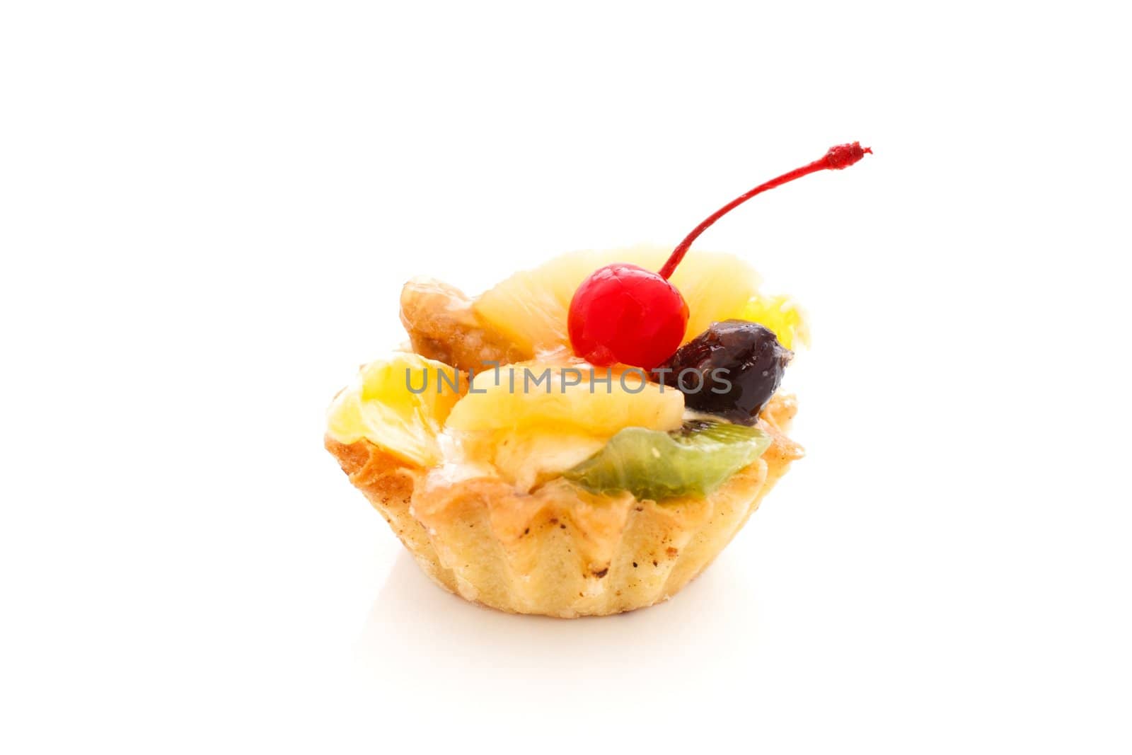 An image of a cake with cherry on top. On white background.