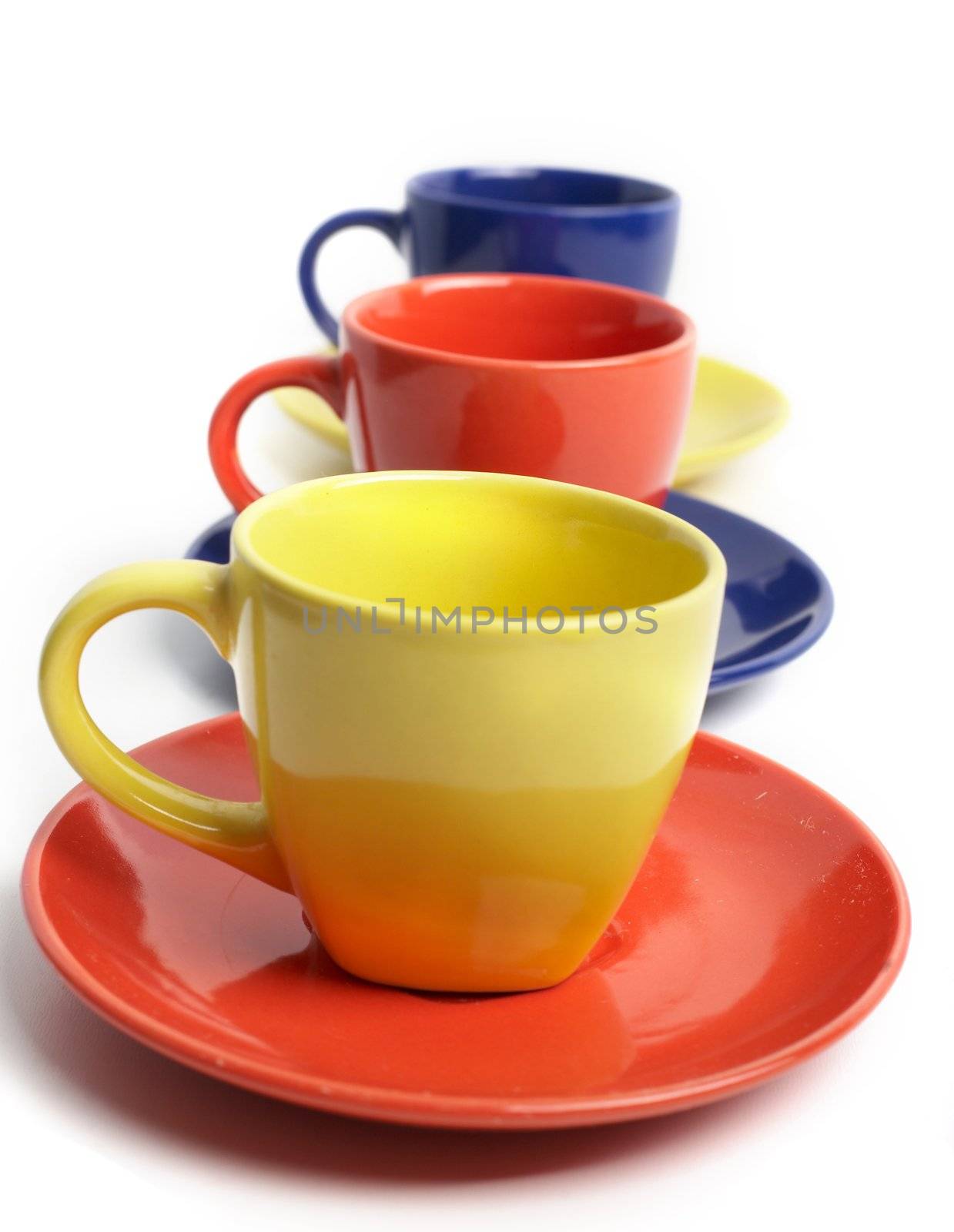 An image of color cups and saucers