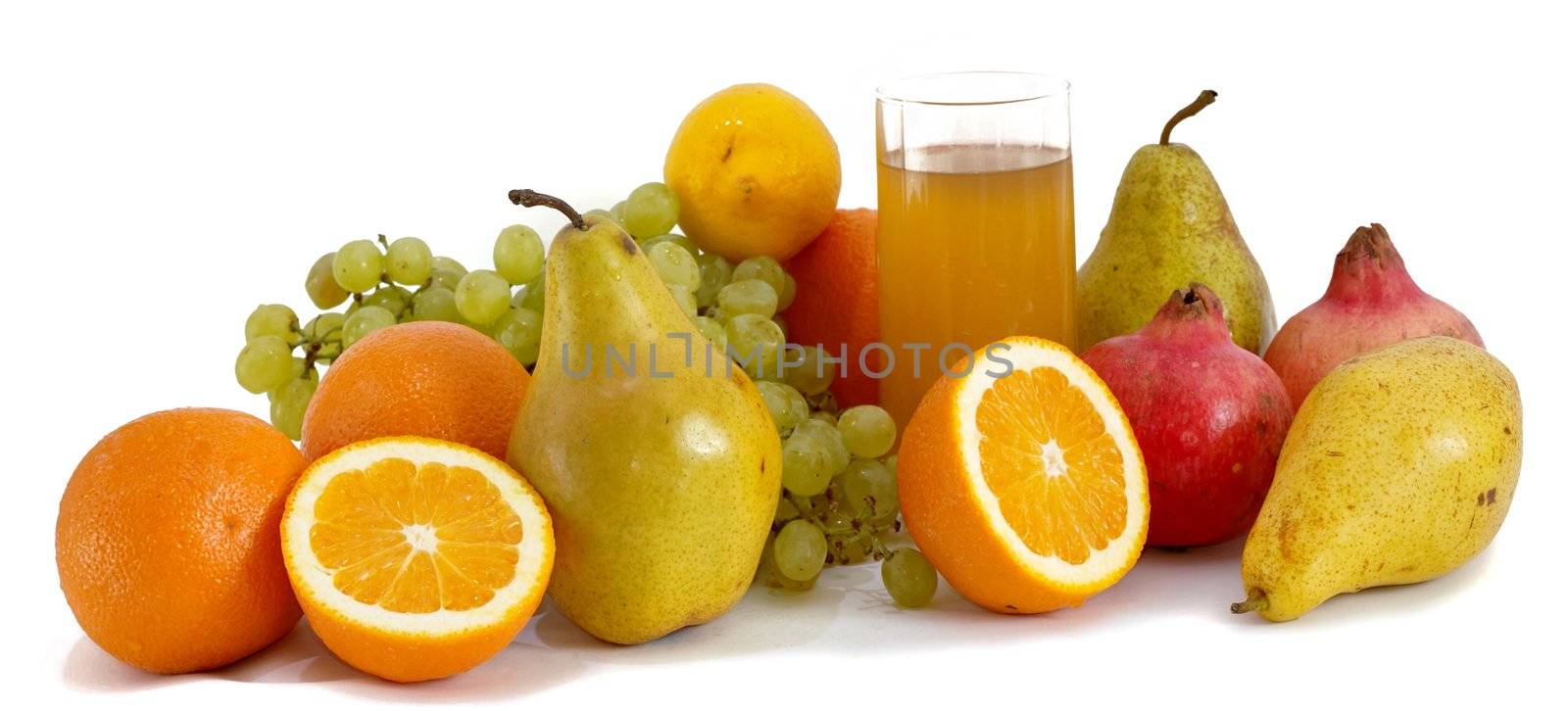 Still-life of fruits and glass with juice