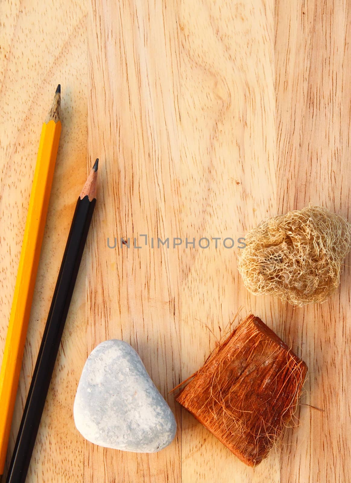 Pencils on decorated wood background with copy space