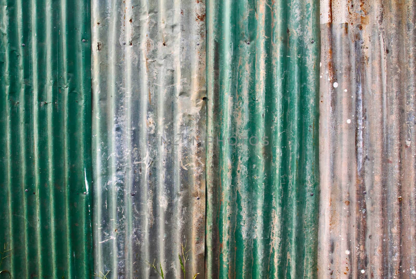 Old rusted corrugated metal wall