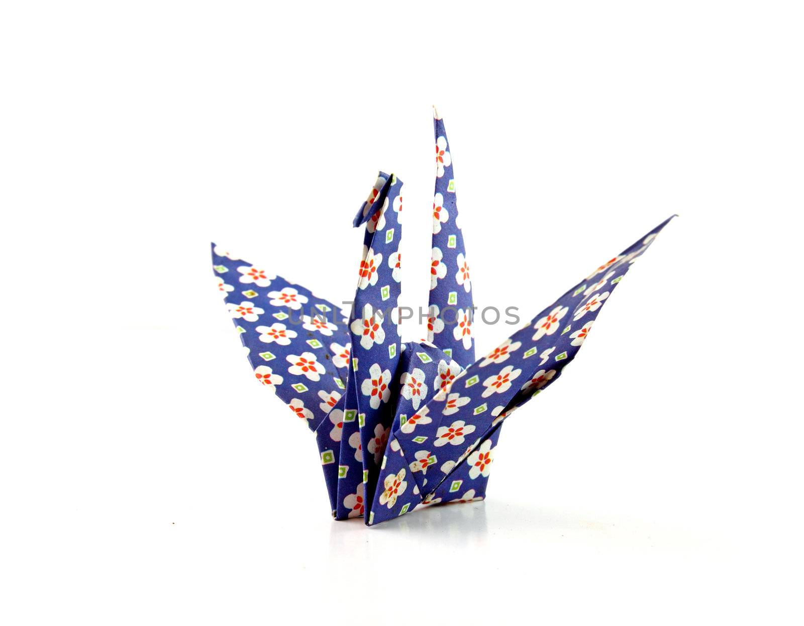 Crane origami bird folded with a floral pattern paper  by nuchylee