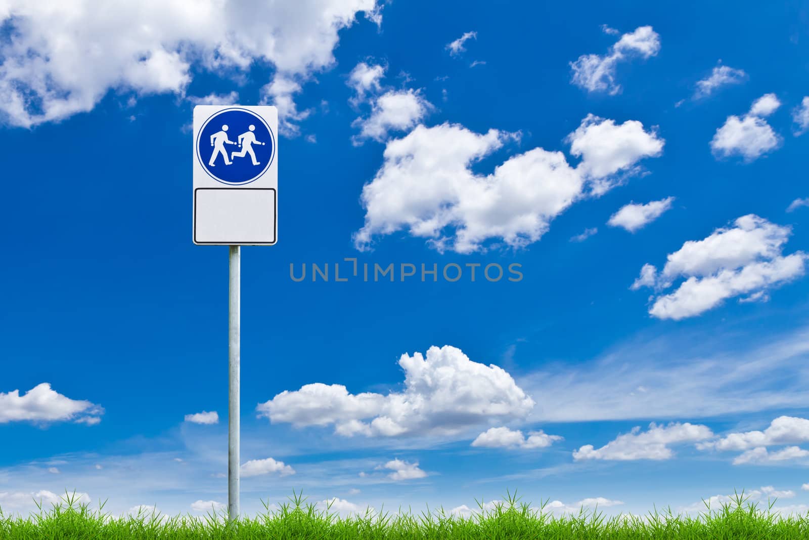 walk way sign against blue sky by tungphoto