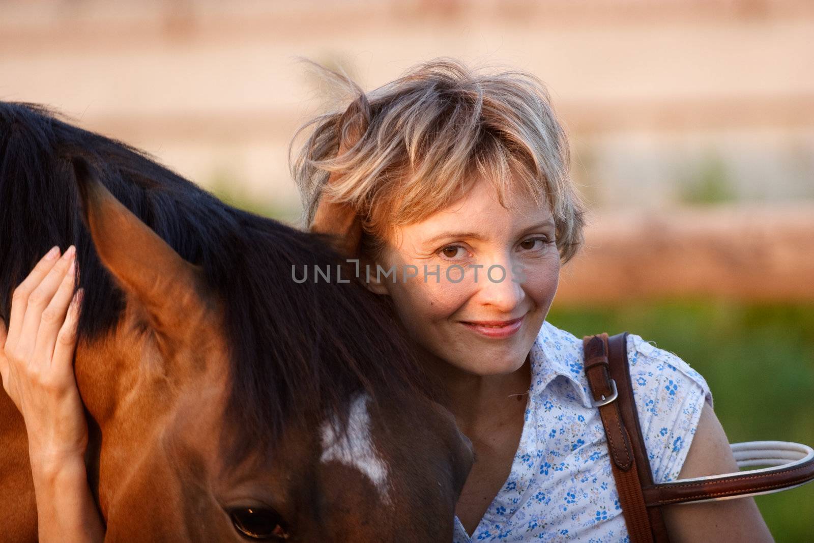 Woman looking to horse