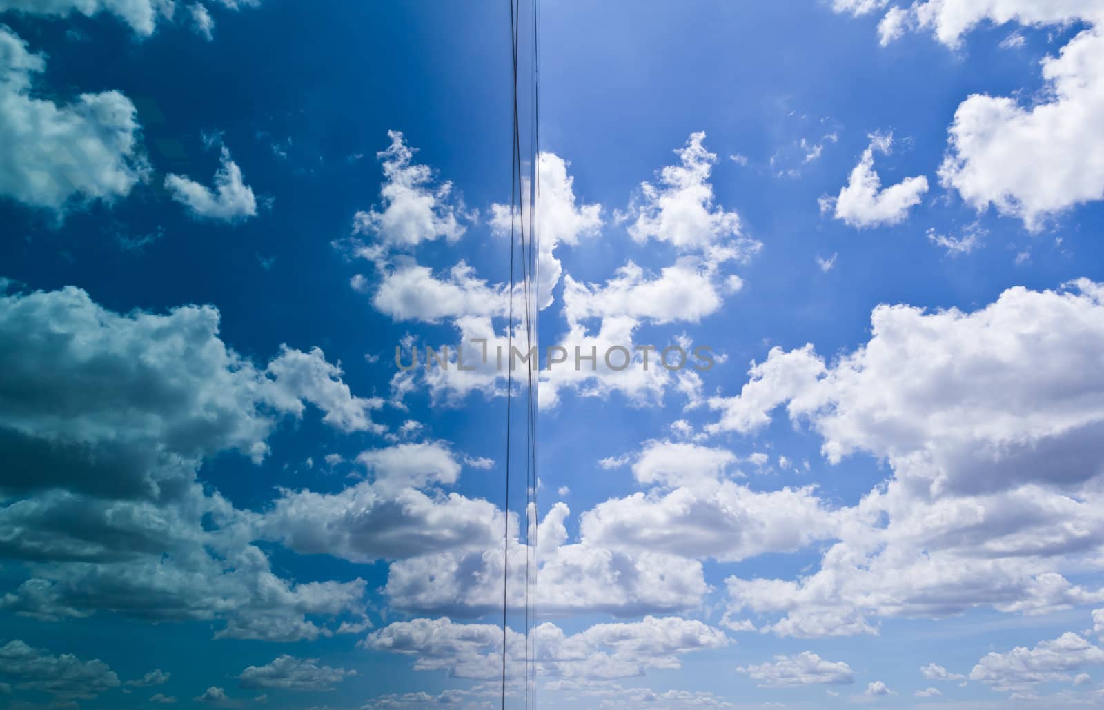 cloud and sky reflection in mirror of office building