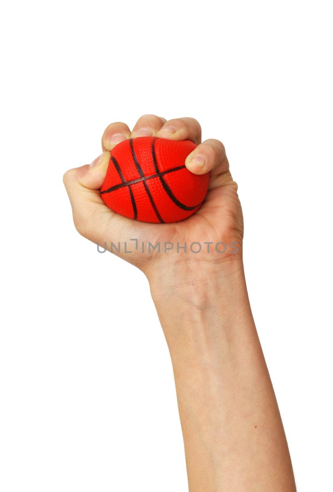 one isolated hand squeezes small sponge basketball toy ball over white background