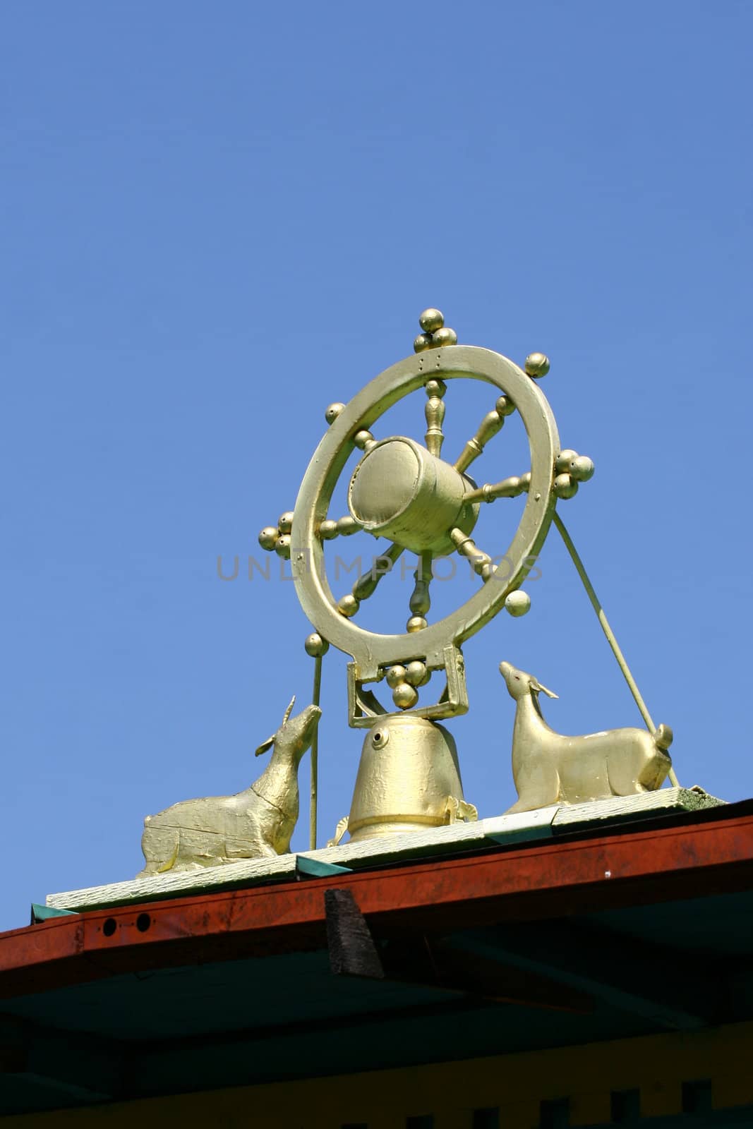 Wheel figure on a roof buddas monastery