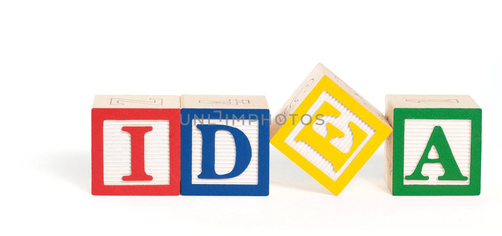 Alphabet blocks arranged to spell the word, "idea."  Isolated on white with clipping path.