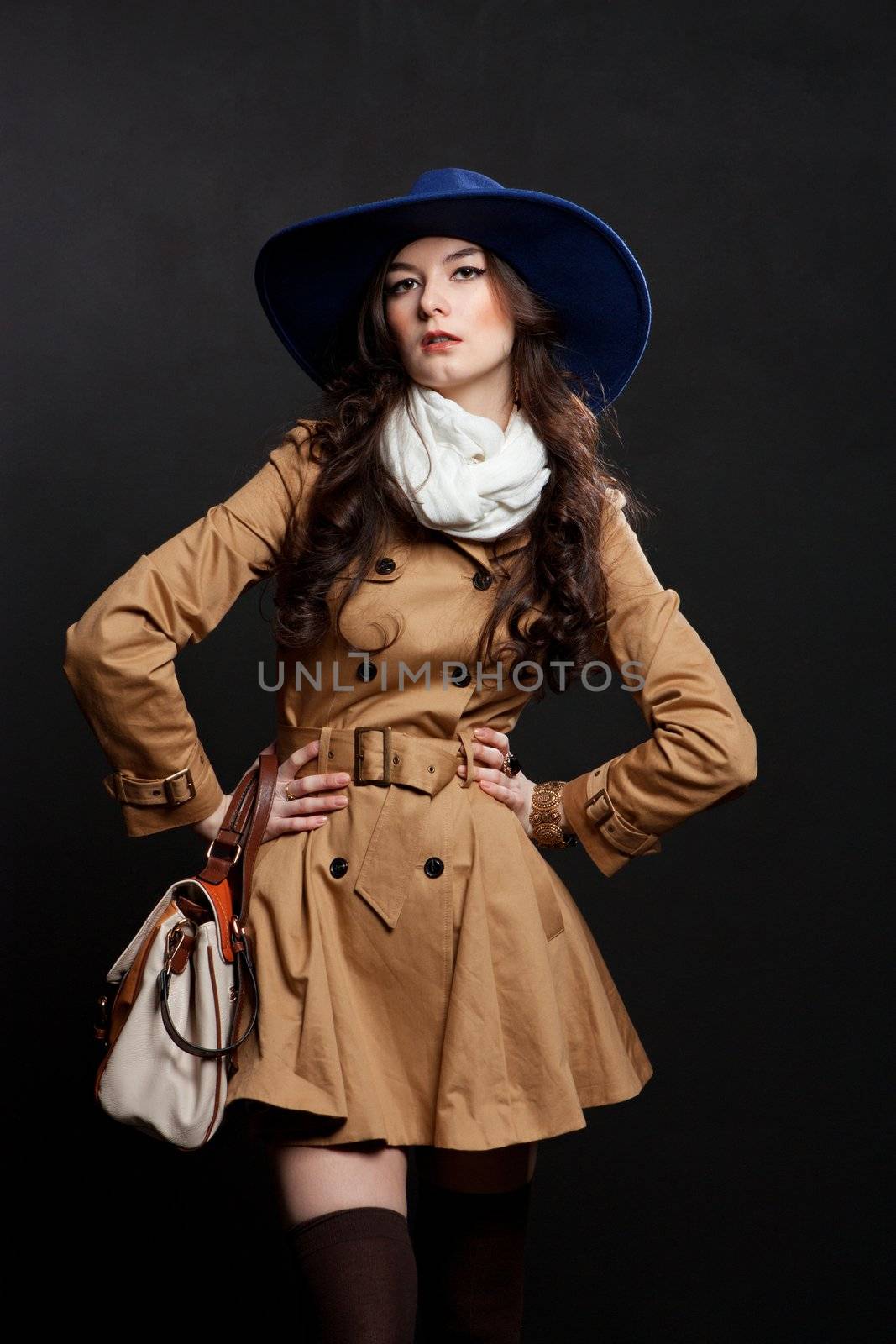 woman wearing brown overcoat and cap blue by nigerfoxy