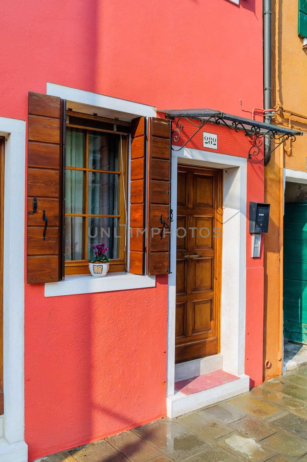 Door and windows colorful houses of Burano, Venice, Italy